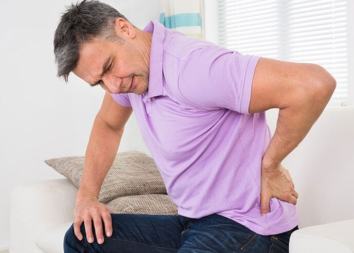 pain in the lower back in a man